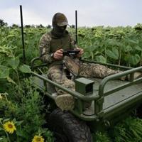 Under a drone canopy, Ukraine army medics rely on robots and luck