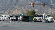 Semi truck rollover in Provo closes I