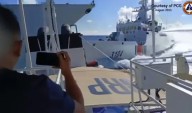 China says it expelled Philippine vessels in disputed sea