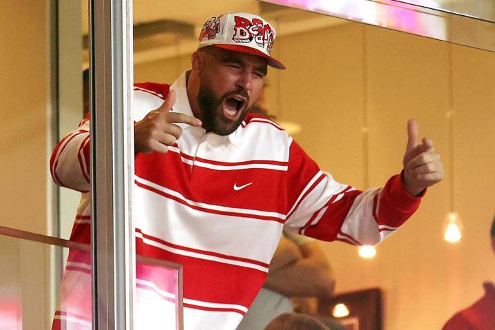 Travis Kelce Goes Head-to-Toe Red in First Newly Engaged Outing with Taylor Swift