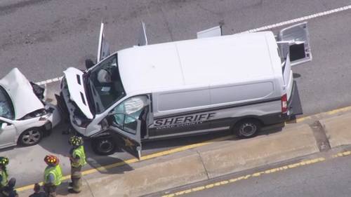 Driver charged after crash with Wake County Sheriff's Office transport van