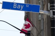 S&P/TSX composite up in late-morning trading, U.S. stock markets down