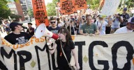 Photos of ‘Free D.C.’ protest against Trump’s federal takeover of Washington police