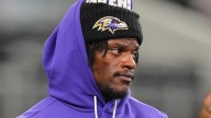 Ravens' Harbaugh says there's 'no damage' to Lamar Jackson's foot after it was stepped on