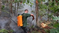 Villagers jump into action as wildfires threaten homes
