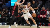 Sources - Bucks add free agent Amir Coffey on 1