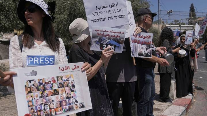 Israelis and Palestinians protest for peace as journalist Mariam Dagga's family mourns her death