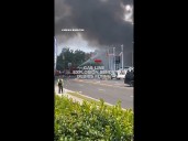 Gas line explosion sends debris flying