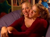 Conjoined sisters Abby and Brittany Hensel spotted carrying newborn baby