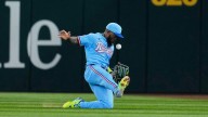 Rangers place Adolis García on injured list, activate Evan Carter