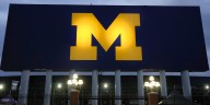 Michigan football fined 10s of millions of dollars, coach suspended 3 games in sign