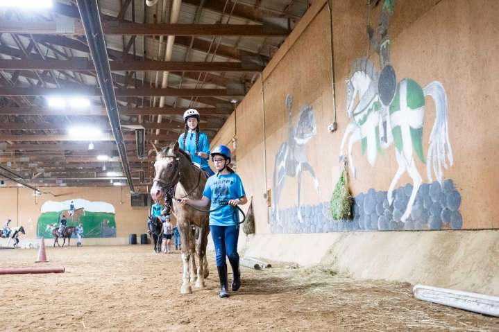 Scouts learn horsemanship skills as part of summerlong merit badge academy
