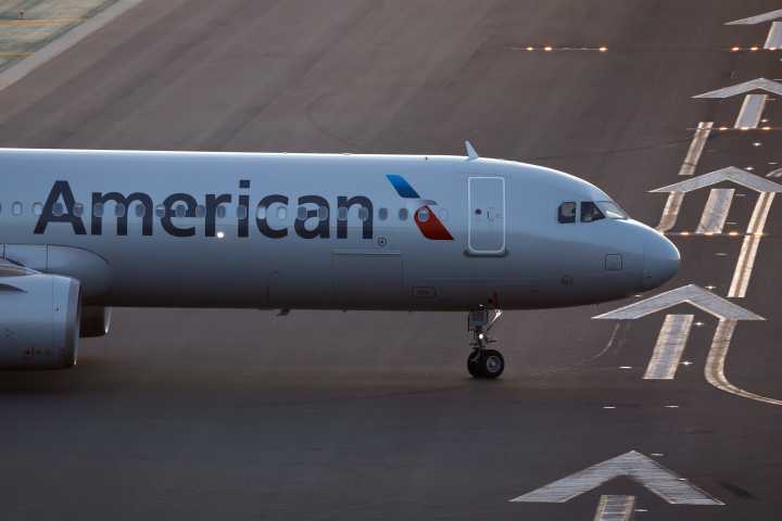 Flight diverts after passenger device catches fire