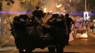 Police chase anti-government protesters in Serbia as president pledges crackdown