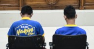 Islamic court in Indonesia sentences 2 men to public caning after they were caught hugging and kissing