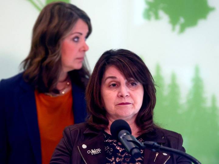 Alberta minister defends COVID shot fees, says others will follow