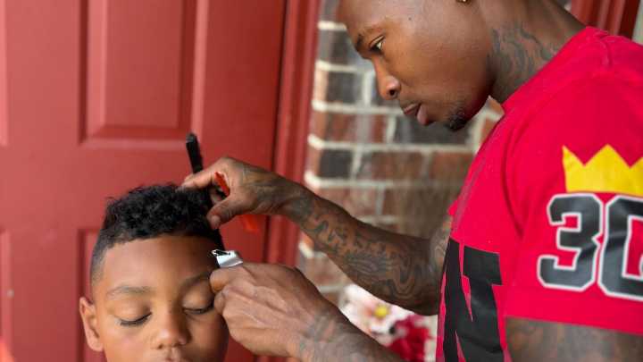 Local barber gives back with free haircuts for boys