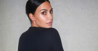 Kim Kardashian flashes famous bum in see-through bikini for cheeky photos