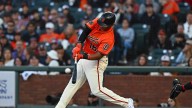 Devers homers early and Giants blank Nationals 5