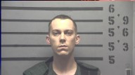 MPD says naked man arrested after shots fired inside apartment