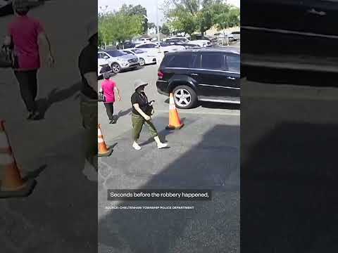 Police search for suspects in armored truck robbery