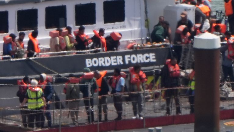 First migrants detained under returns deal with France