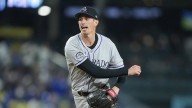 Rockies relief pitcher Jimmy Herget has fun with media with humorous T