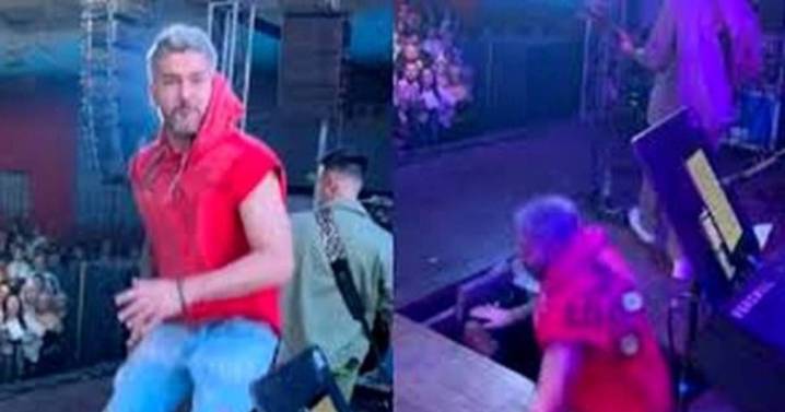 El cantante de Dale Q’ Va se cayó del escenario durante un show
