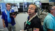 Wall Street Soars as Powell Hints at Rate Cut in September
