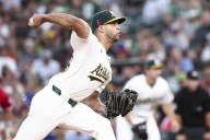 Morales, Rooker lead Athletics to 7