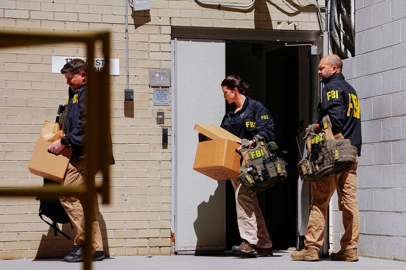 FBI agents search Trump critic Bolton's home in latest move against rival