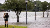 Hurricane Erin leaves rough seas with 2 swimmers dead and a search underway for a missing boater