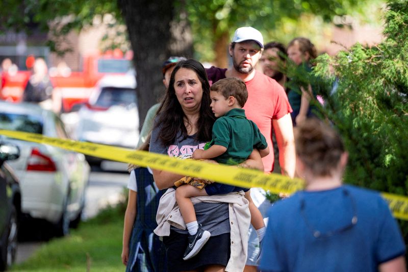 Shooter kills two Minneapolis schoolchildren in church, injures 17