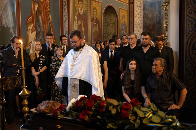 Ukraine buries reporter who died in Russian captivity, urges release of others