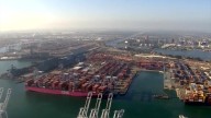 Trump’s broad tariffs go into effect, just as economic pain is surfacing 