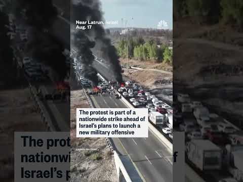 Protesters block Israeli road demanding Gaza ceasefire