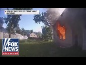 Dramatic rescue video shows child jumping from burning home