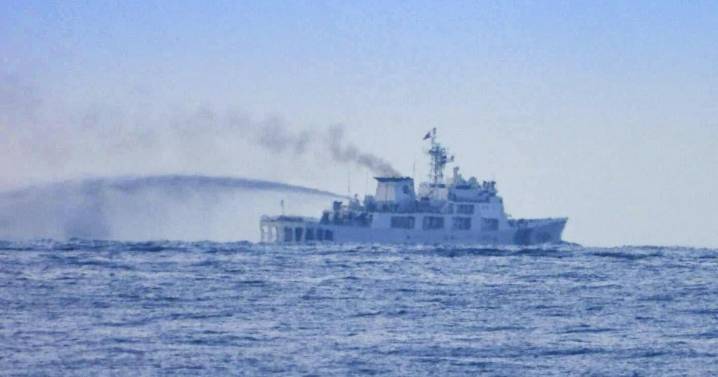 Philippines condemns China's swarm of forces near disputed shoal and vows to defend the territory