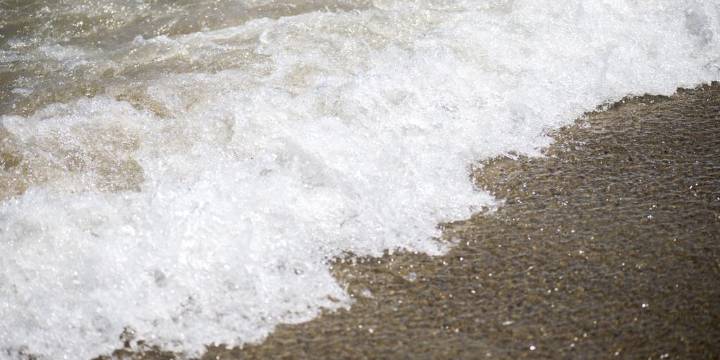 New Hampshire police officers respond to a drowning teen at Hampton Beach on Sunday