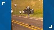 Football coaches assist mother and child involved in car crash