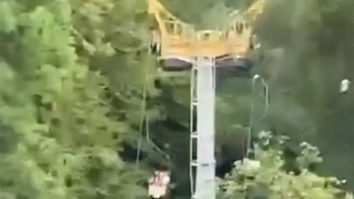 Horror moment chairlift COLLAPSES at Russian resort leaving 13 dangling in the air & four plunging into lake below