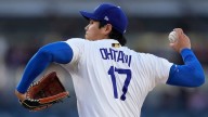 Shohei Ohtani pitches first victory with Dodgers, striking out season