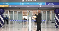 The walking bridge at Denver International Airport is open for departing and arriving passengers
