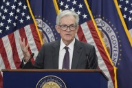 US inflation held steady last month as tariff hit offset by cheaper gas, food