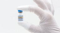 FDA approves updated COVID-19 shots with limits for some kids and adults