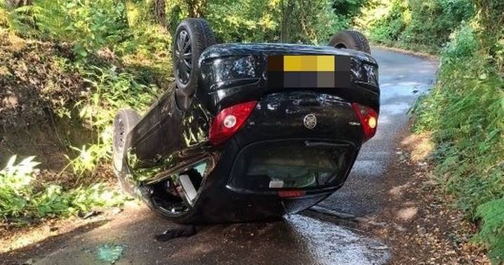 Car flips and lands on its roof after dramatic crash near beauty spot