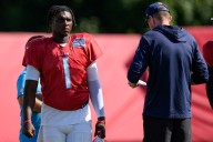 Falcons QB Michael Penix Jr. lands at bottom of pile during joint
