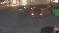 Video shows driver take off after hitting woman in Phoenix parking lot