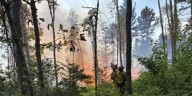 Crews use old and new techniques to fight forest wildfire