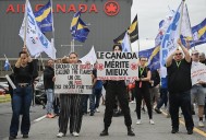 Air Canada passengers still scrambling to rebook as labour dispute grounds flights